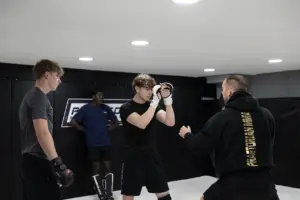 Martyn Styler coaching teenagers during an MMA class at Praetorian MMA